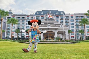 Painter Mickey Mouse in front of Disney's Riviera Resort.